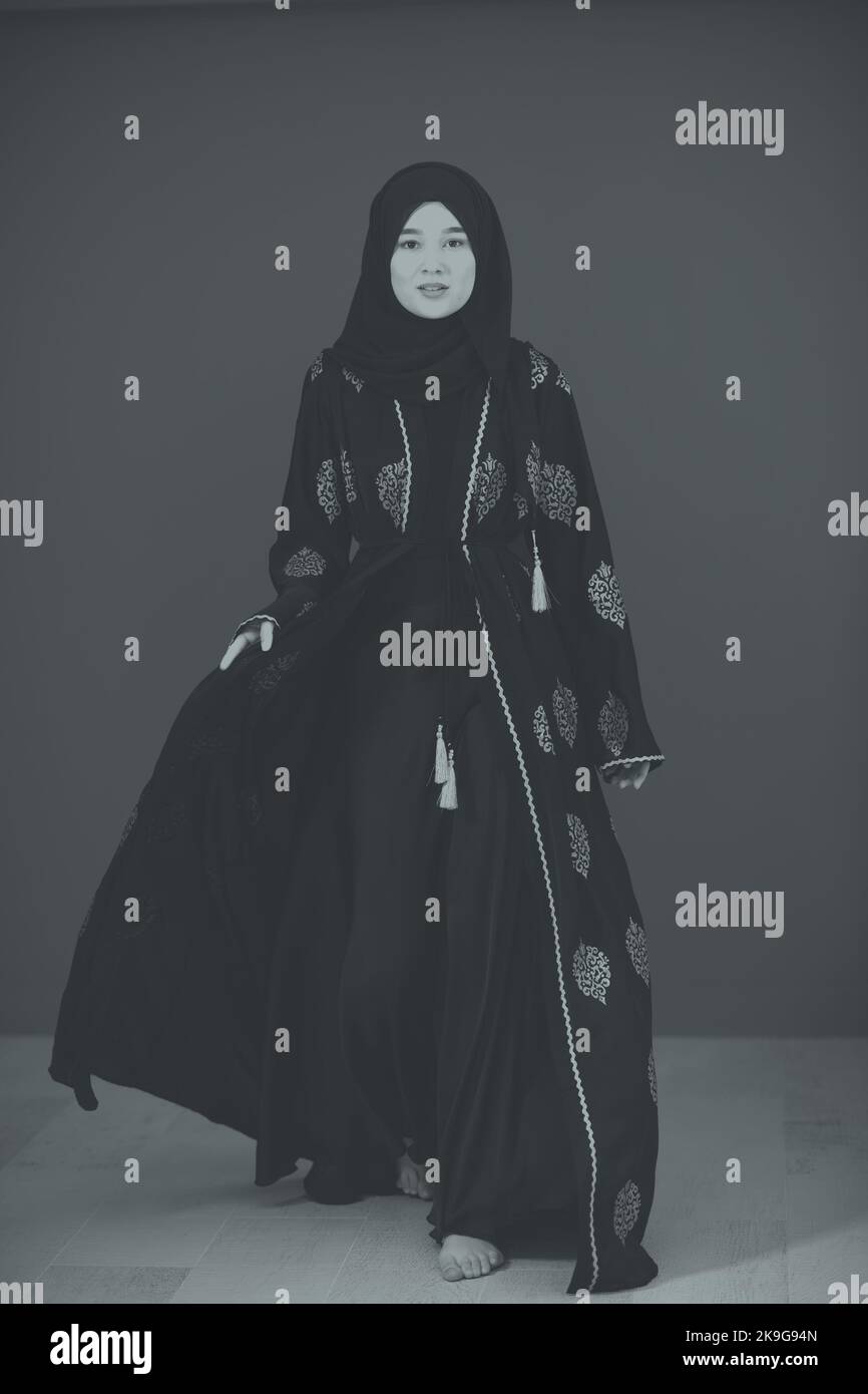 Black white photo of beautiful muslim woman in fashinable dress with ...