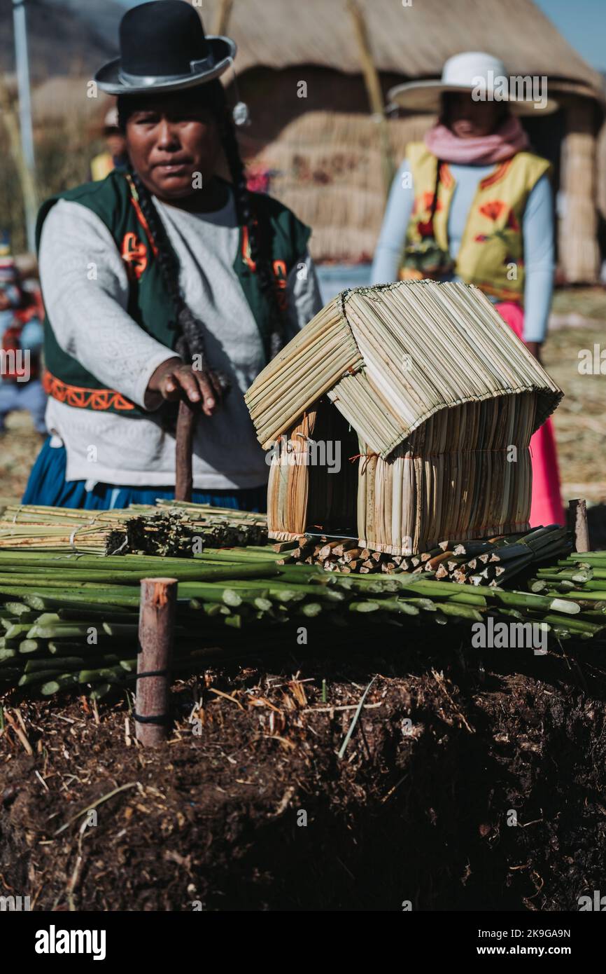 The Uru or Uros (Uru: Qhas Qut suni) are an indigenous people of Peru and Bolivia Stock Photo