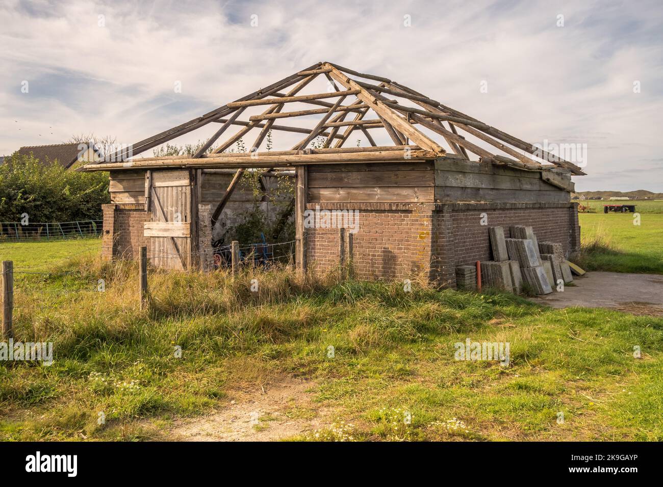 Texel, Netherlands. October 2022,. An old, half collapsed barn on Texel. High quality photo Stock Photo