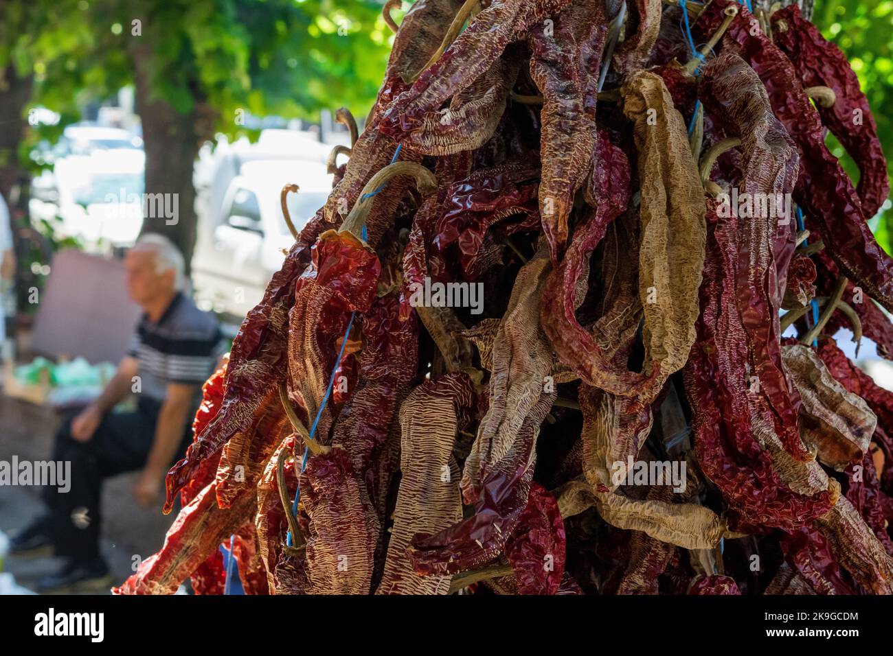 A bunch of dried red chili peppers, for sale at an open green market in ...