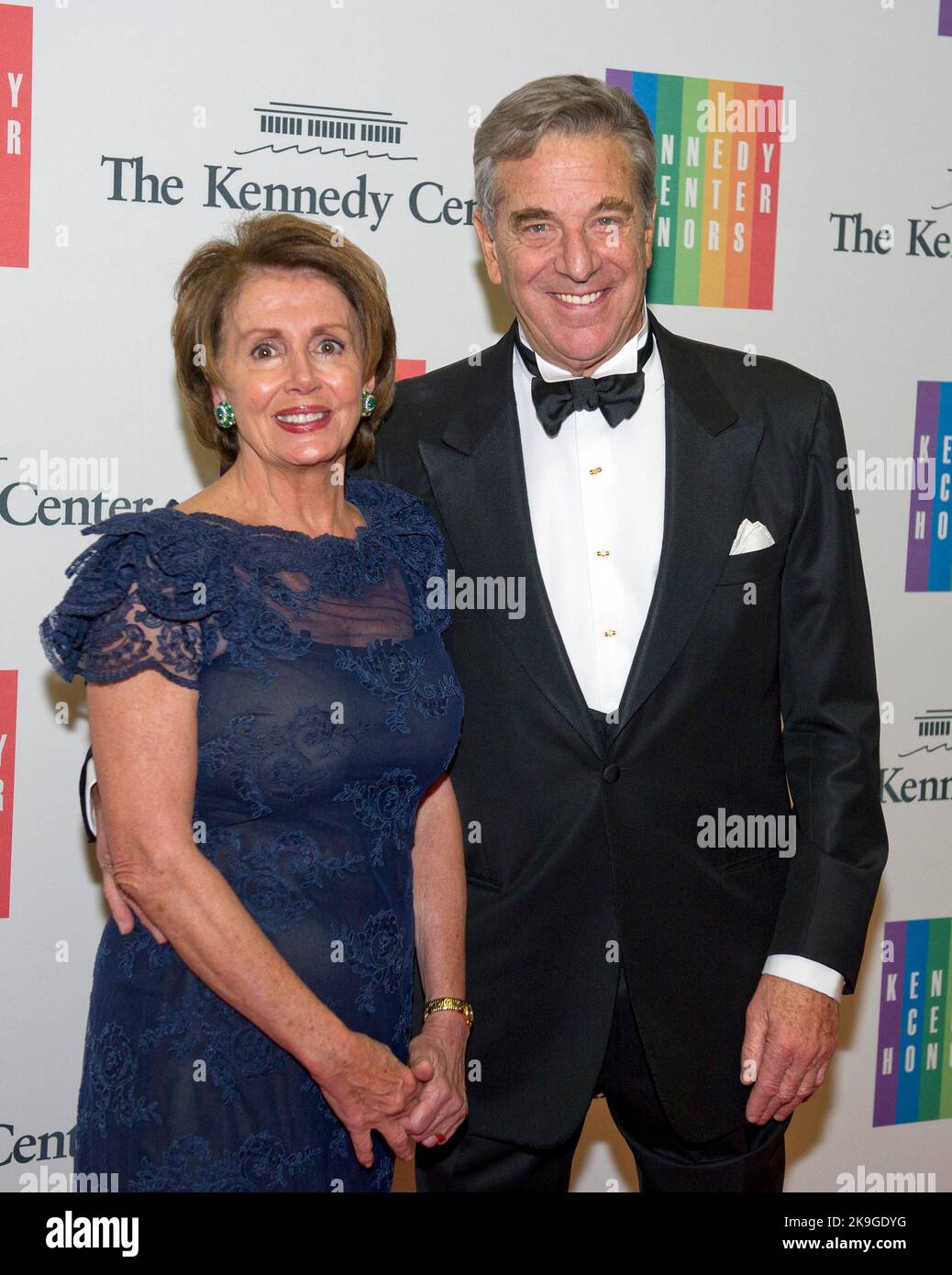 United States House Democratic Leader Nancy Pelosi (Democrat of California) and her husband, Paul, arrive for the formal Artist's Dinner honoring the recipients of the 2014 Kennedy Center Honors hosted by United States Secretary of State John F. Kerry at the U.S. Department of State in Washington, D.C. on Saturday, December 6, 2014. The 2014 honorees are: singer Al Green, actor and filmmaker Tom Hanks, ballerina Patricia McBride, singer-songwriter Sting, and comedienne Lily Tomlin.(Photo by Ron Sachs / Pool /Sipa USA) Stock Photo