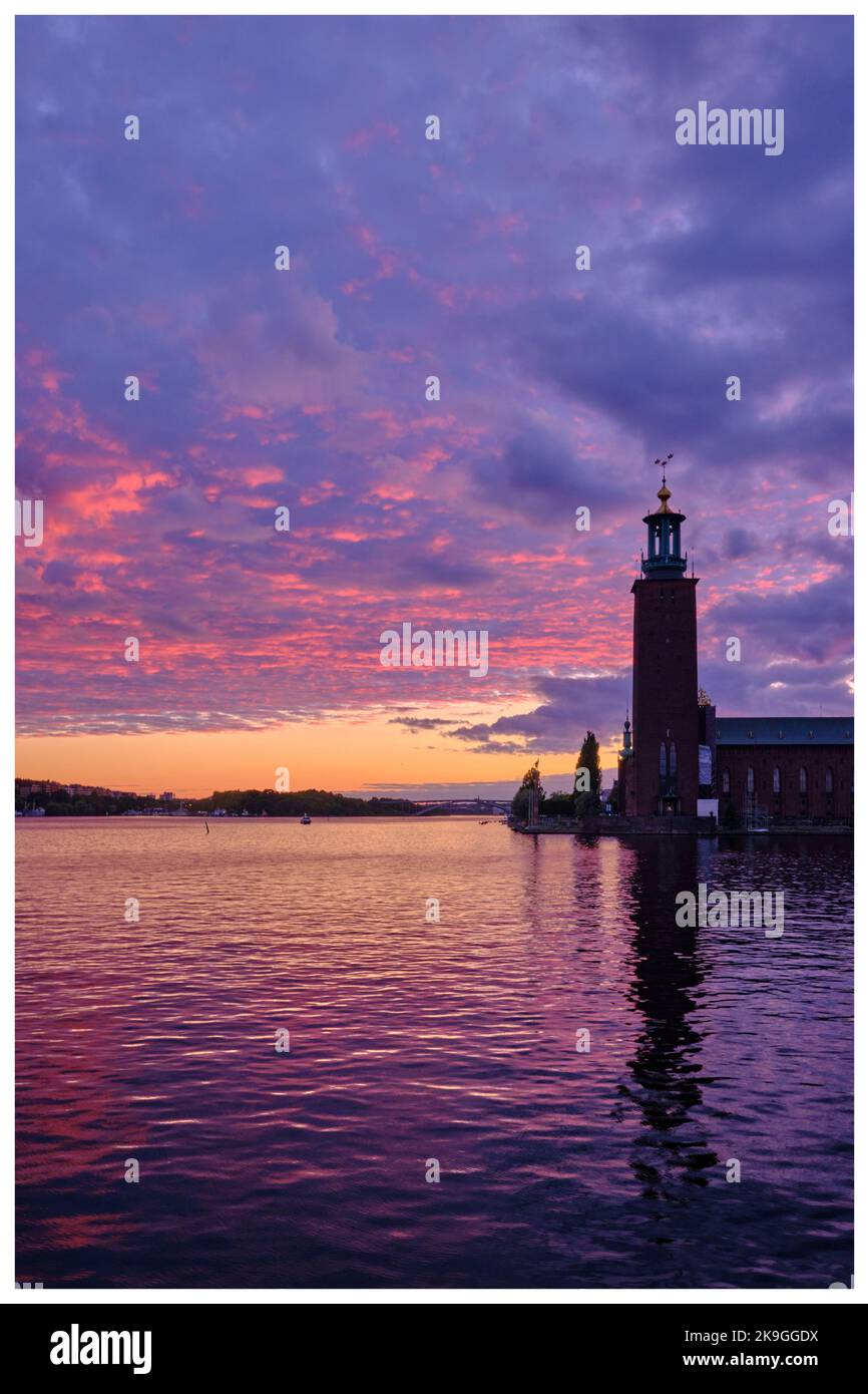 Stockholm, Sweden - Sept 2022:  Stockholm City Hall or Stadshuset at purple sunset in the Old Town in Stockholm, capital of Sweden Stock Photo