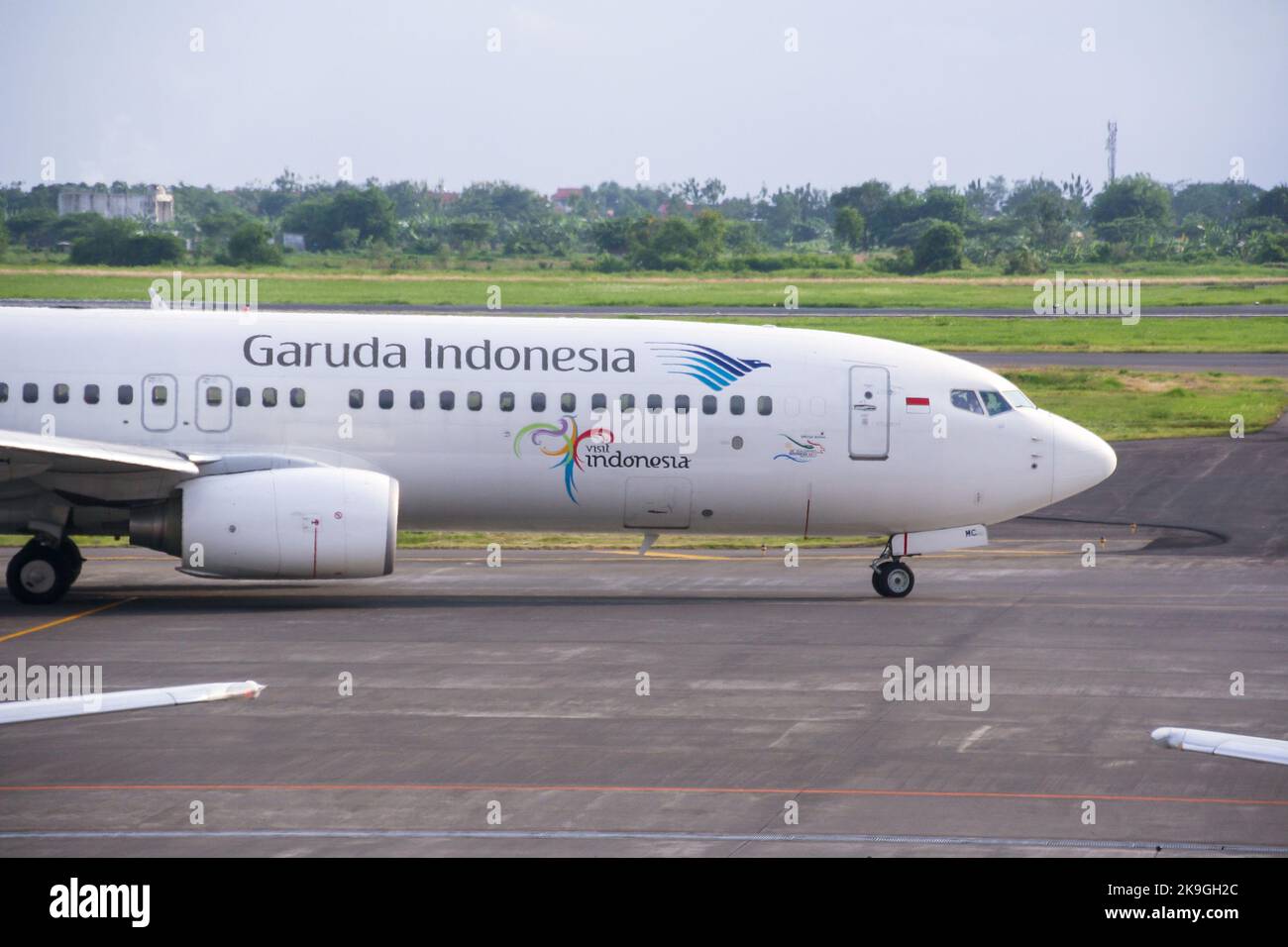 View of Garuda Indonesia airliner on runway at Juanda International