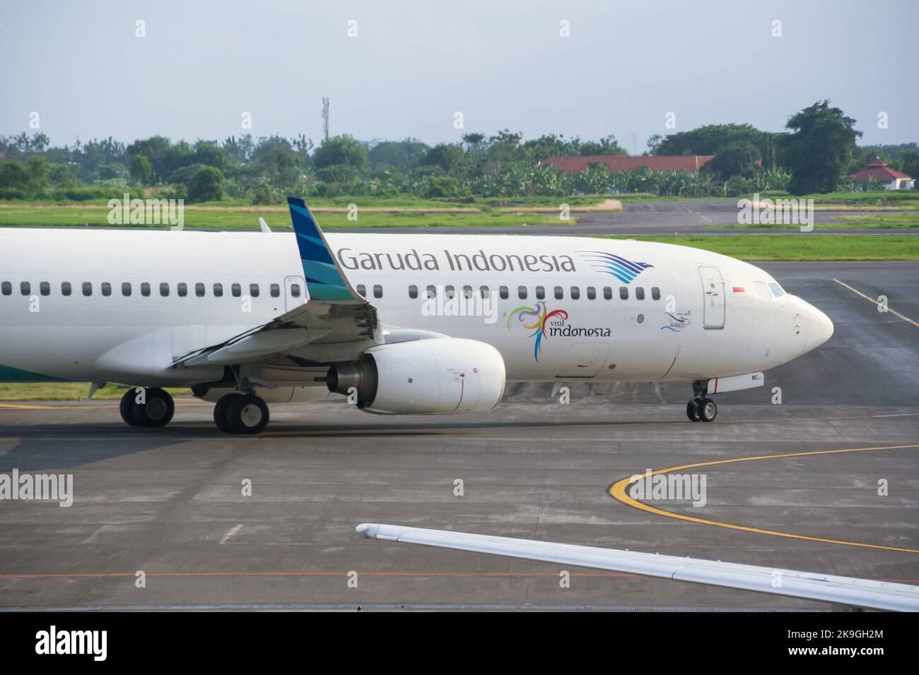 View of Garuda Indonesia airliner on runway at Juanda International