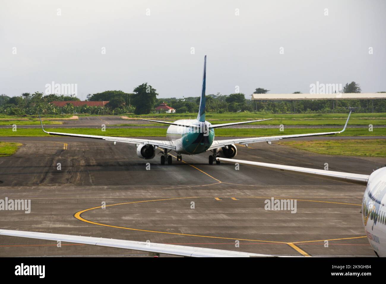 View of Garuda Indonesia airliner on runway at Juanda International