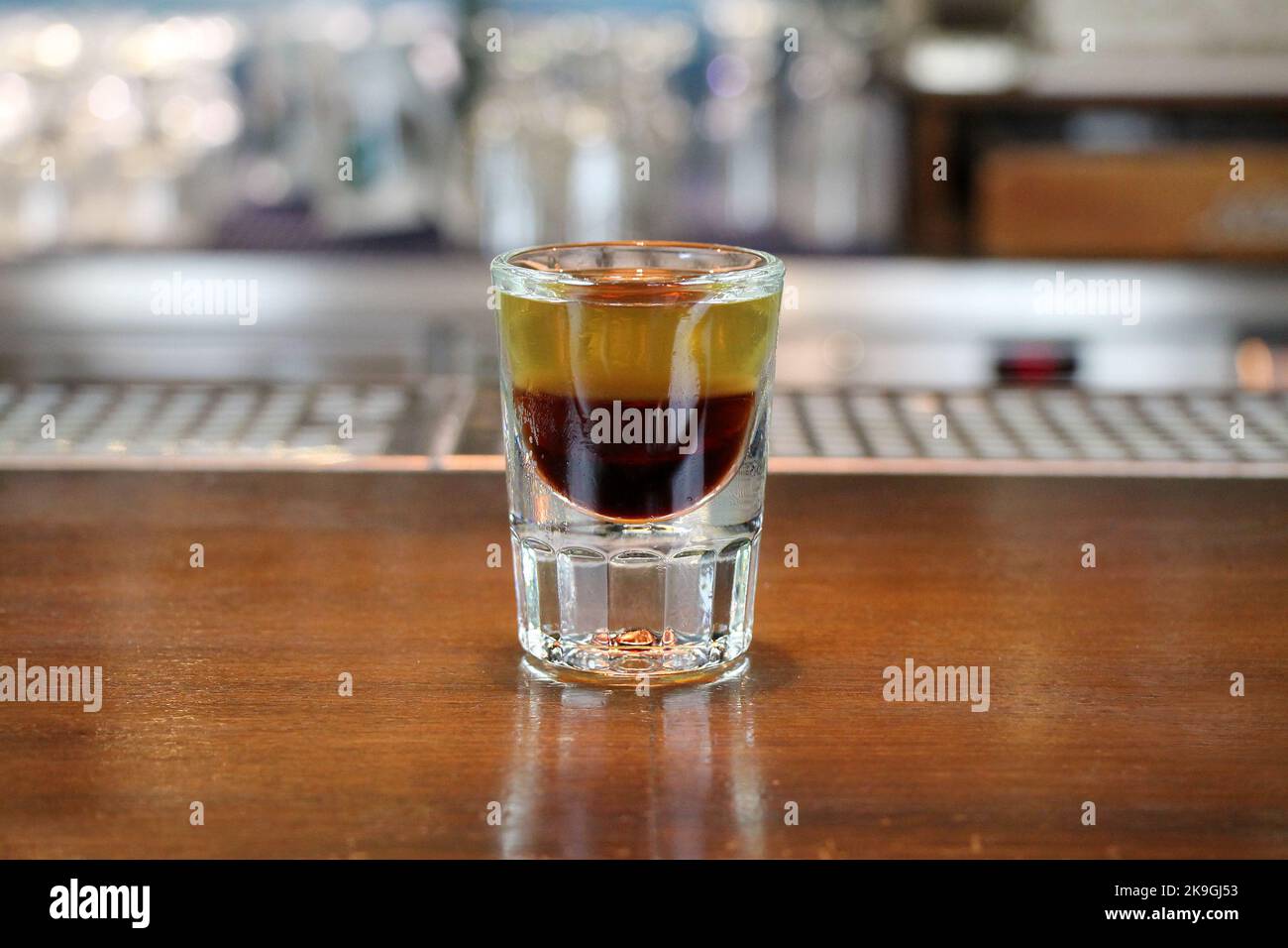 Shot drink - B52 on bar counter Stock Photo