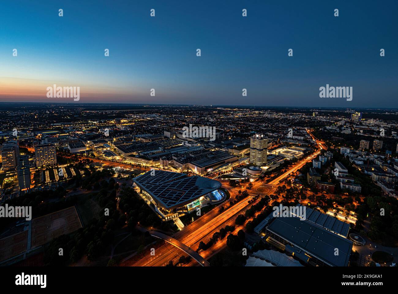 An aerial view of BMW headquarters in Munich, Germany at dusk Stock Photo