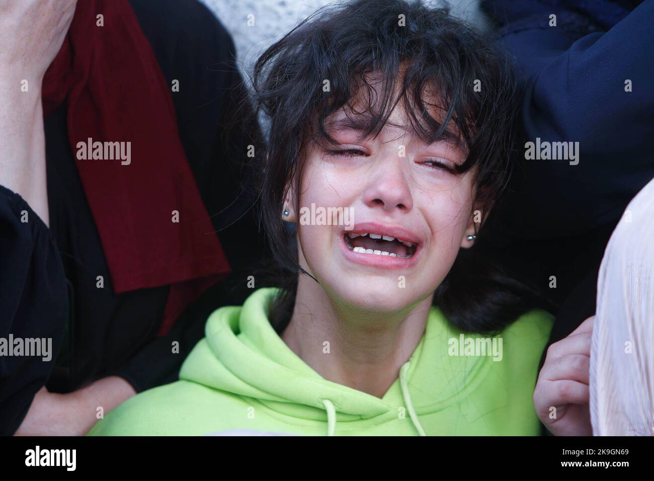 Nablus, Palestine. 28th Oct, 2022. A relative mourns during the funeral ...
