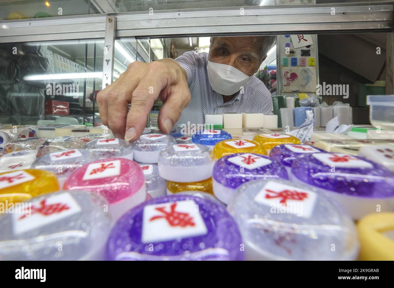 Cheung Shun-king, Mahjong tile artisan and owner of Biu Kee Mah-Jong, poses for a picture at Biu Kee Mah-Jong in Jordan. The old mahjong tile shop is forced to close at the end of October as it is evicted by the Buildings Department.  06OCT22 SCMP/ Edmond So Stock Photo