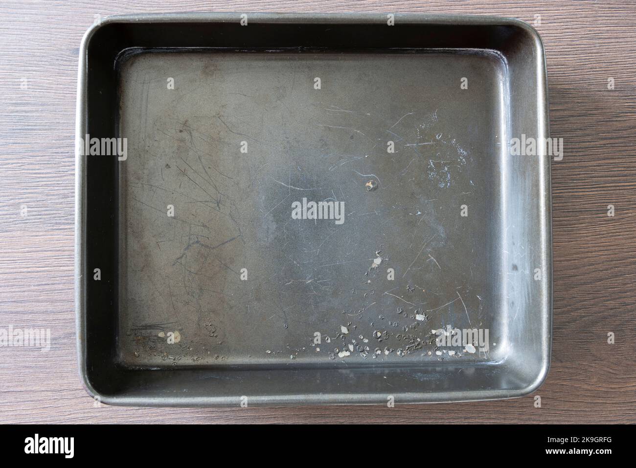 Chipped teflon PTFE (polytetrafluoroethylene) non stick coating on a