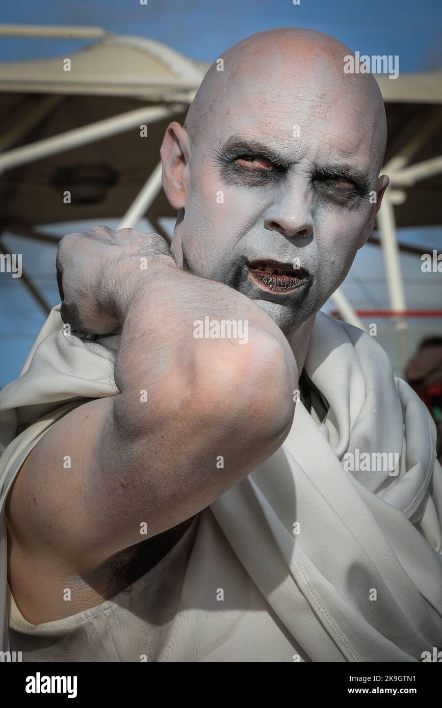 London, UK. 28th Oct, 2022. A visitor poses as scary character Gorr from Thor. Cosplayers, fans of anime, films and other visitors, most of them in costume, enjoy the opening day of MCM Comic Con at Excel London. Credit: Imageplotter/Alamy Live News Stock Photo
