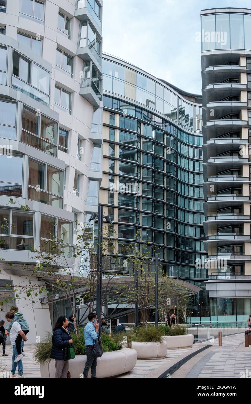 People talk on phones and walk along London’s new pedestrianised high