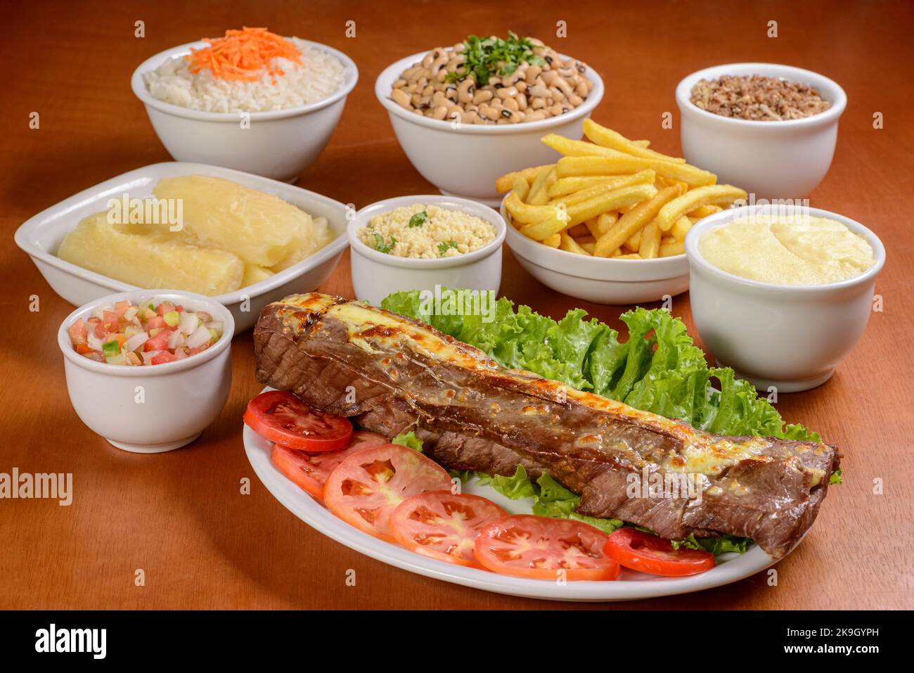 Sun meat and side dishes. Carne de sol, salted steak, typical dish from ...