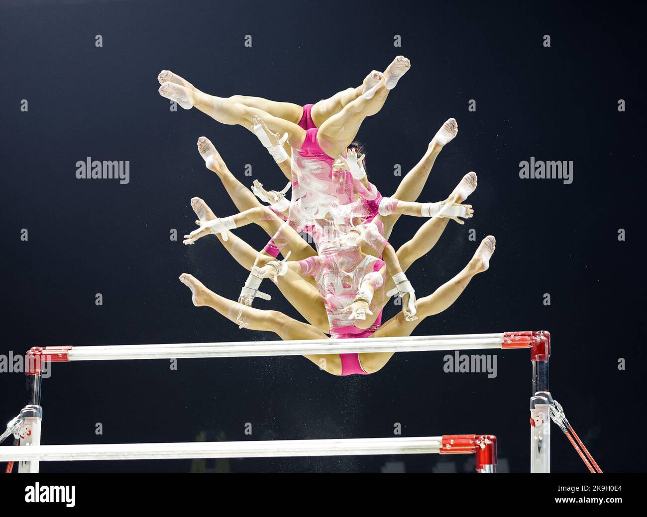Liverpool, UK. 28th Oct, 2022. 28th October 2022, M&amp;S Bank Arena, Liverpool, England; 2022 World Artistic Gymnastics Championships Training; Multiple exposure of Chinese gymnast on the uneven bars Credit: Action Plus Sports Images/Alamy Live News Stock Photo