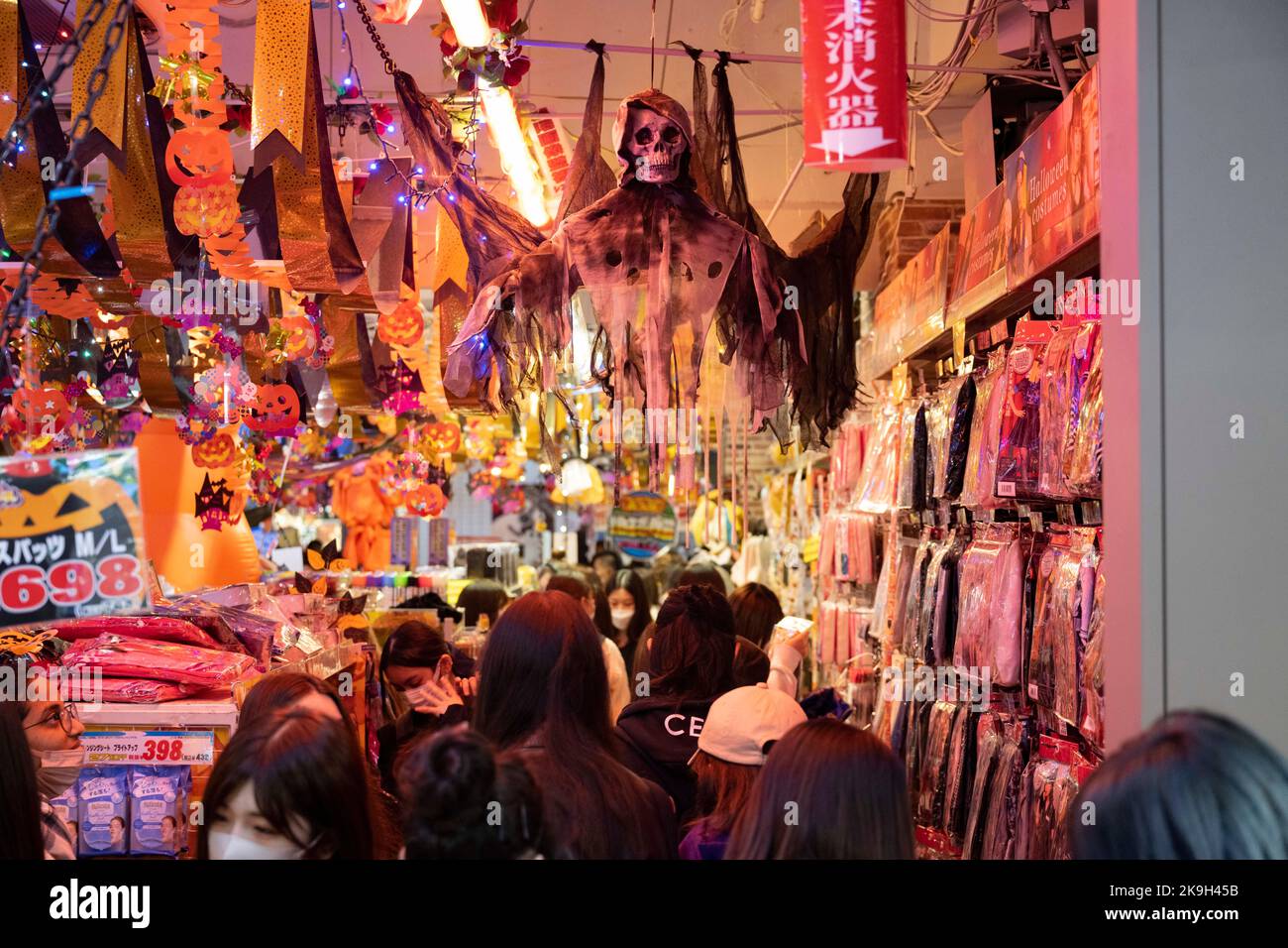 Tokyo, Japan. 28th Oct, 2022. Tokyoites shop for Halloween costumes at the Don Quijote Mega-store on Friday before weekend celebrations in Japan. Japan has recently reopened to tourism after over two years of travel bans due to the COVID-19 pandemic. The Yen has greatly depreciated against the USD US Dollar, creating economic turmoil for international trade and the Japanese economy. Tourists can shop tax free in Japan on a Temporary Visitor visa. (Credit Image: © Taidgh Barron/ZUMA Press Wire) Stock Photo