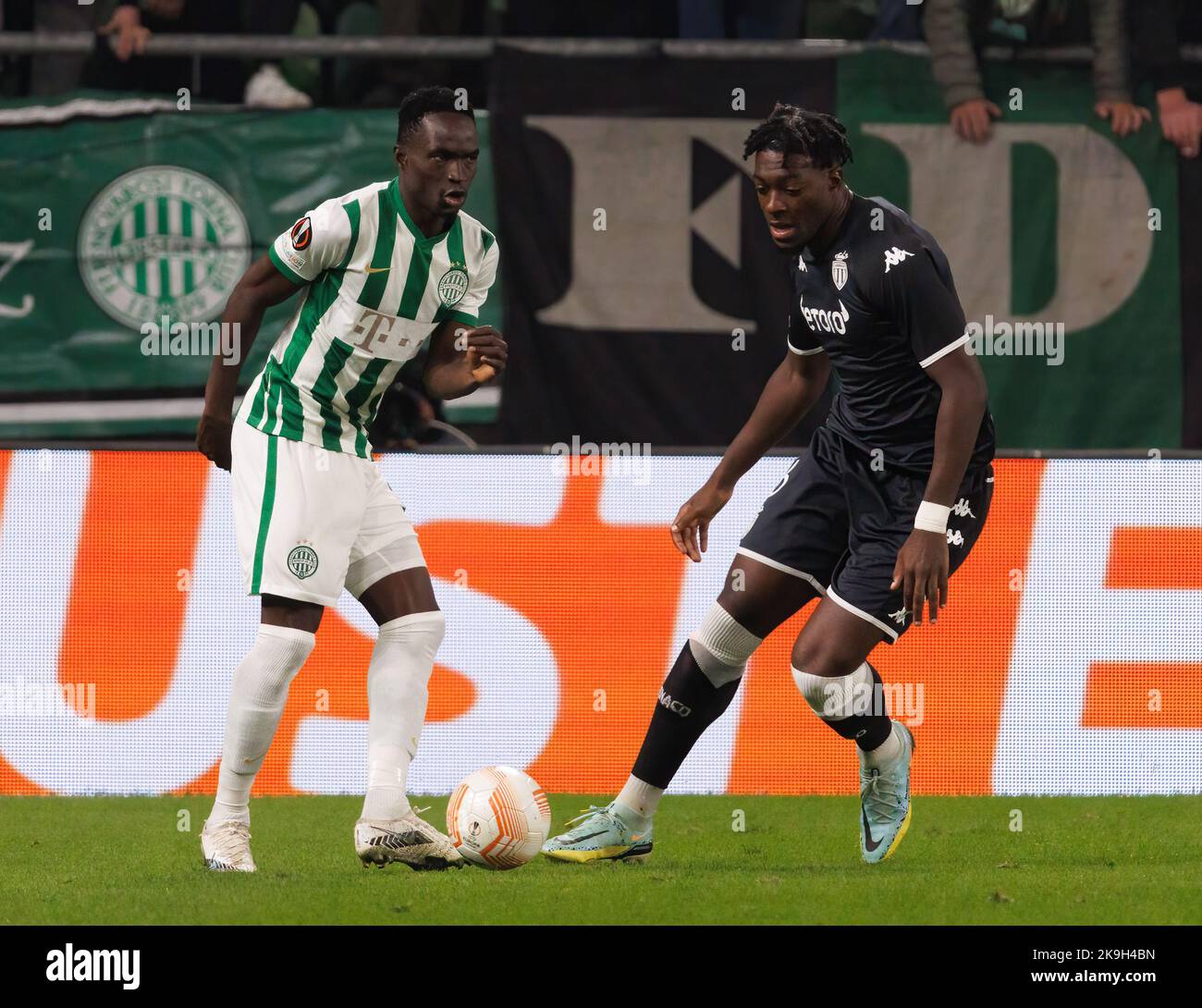 BUDAPEST, HUNGARY - OCTOBER 27: Axel Disasi of AS Monaco challenges Adama Traore of Ferencvarosi TC during the UEFA Europa League group H match between Ferencvarosi TC and AS Monaco at Ferencvaros Stadium on October 27, 2022 in Budapest, Hungary. Stock Photo