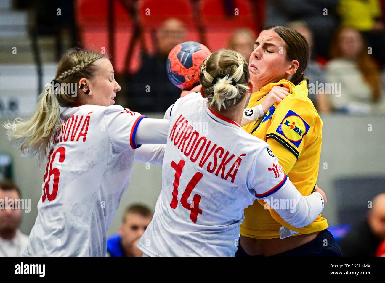 Charlotte Cholevova (L) and Kamilla Kordovska of Czech Republic try to stop Sweden's Carin Strömberg (R) during the women's friendly handball match be Stock Photo