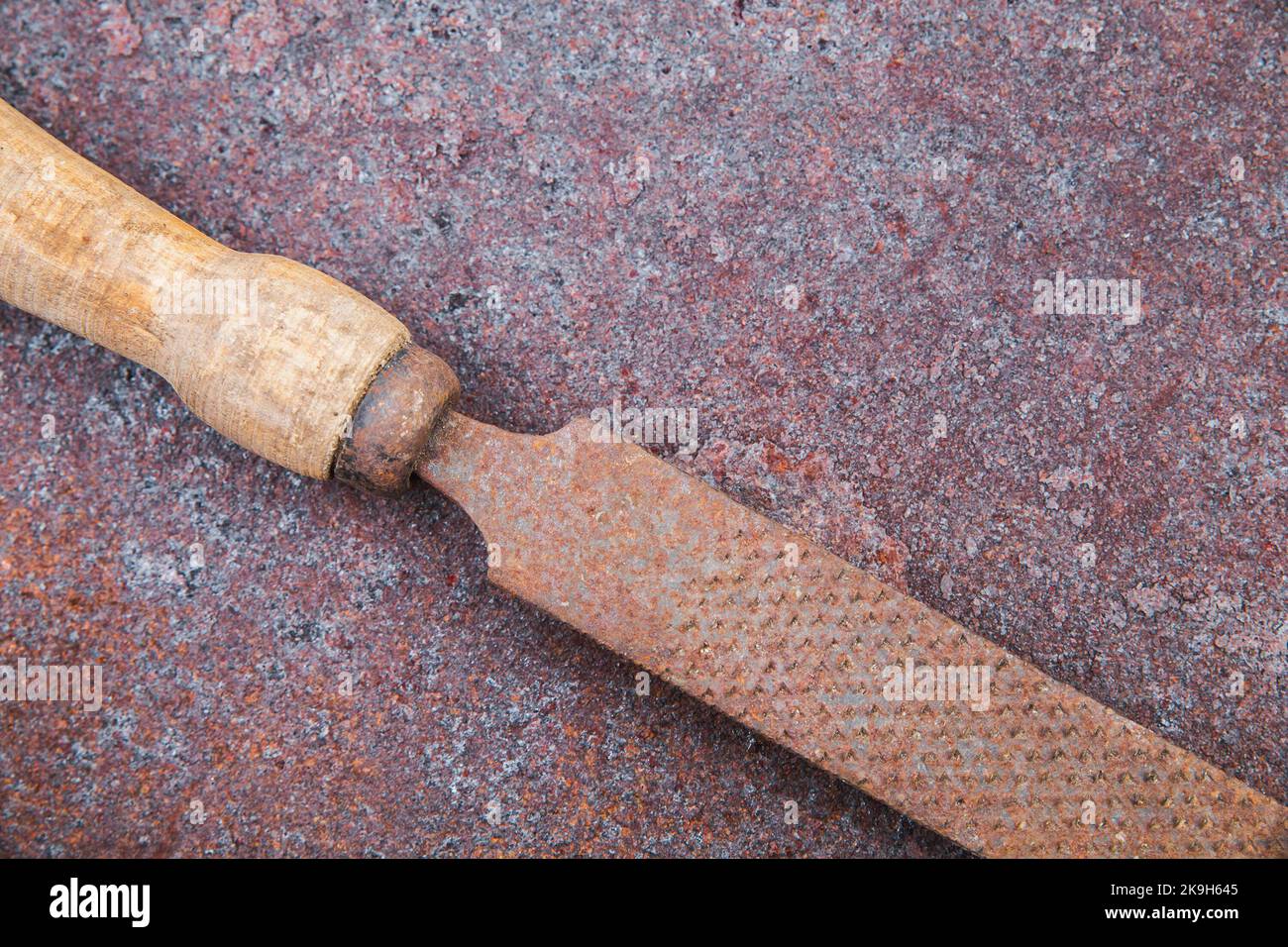 old file on rusty rough metal surface Stock Photo