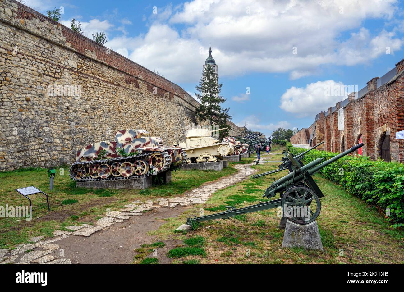 Display of tank and guns by the walls of Belgrade Fortress, looking towards the clock tower, Belgrade, Serbia Stock Photo