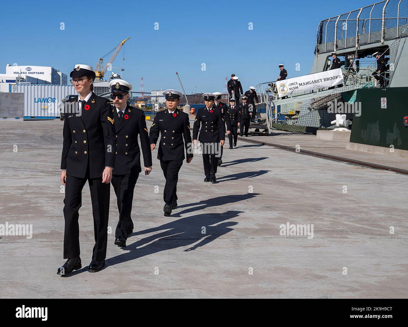 Canada. 28th Oct, 2022. Crew members walk on the jetty at the