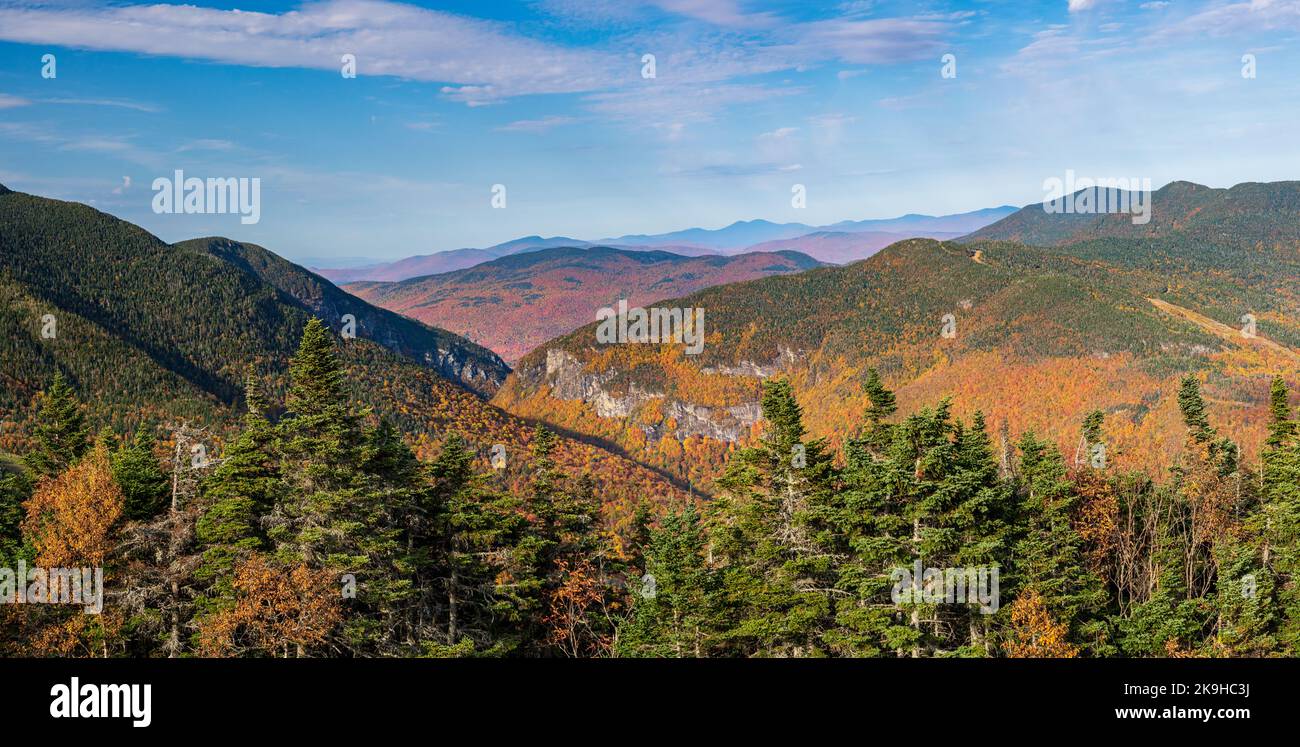 Aerial panorama of Smugglers Notch looking towards the north and away from Stowe in fall colors taken from mountain top Stock Photo