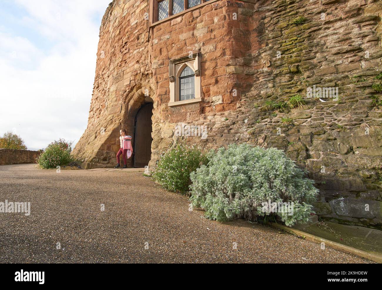 Tourist near a castle wall in Tamworth, UK Stock Photo Alamy