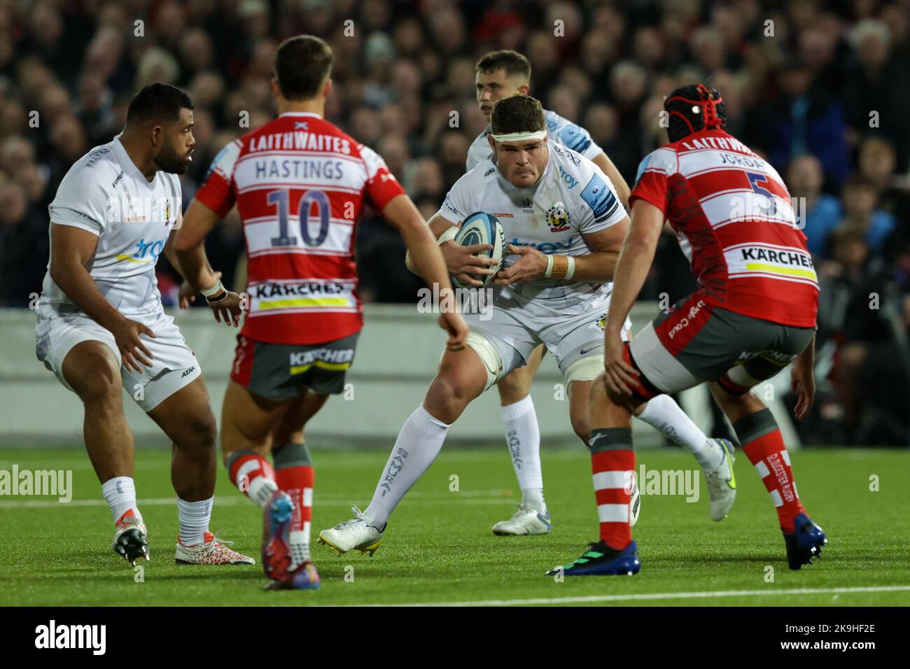 Dave Ewers of Exeter Chiefs is confronted by Cameron Jordan of