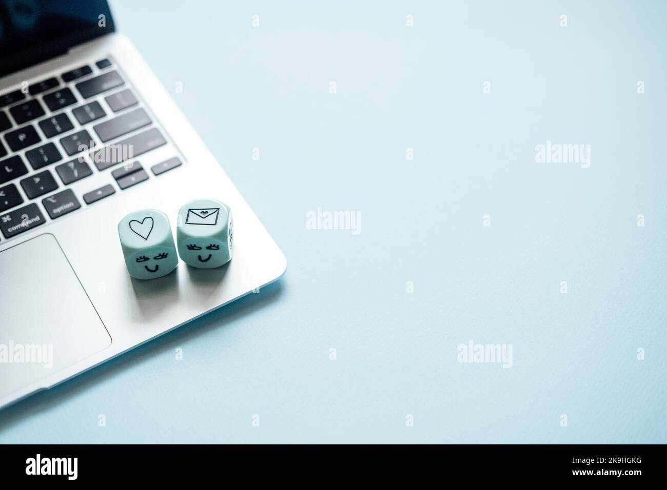 Giving Tuesday, Time to Give, Help, Donation, Support, Volunteer concept with heart cube on laptop on blue background. Its time to give Stock Photo