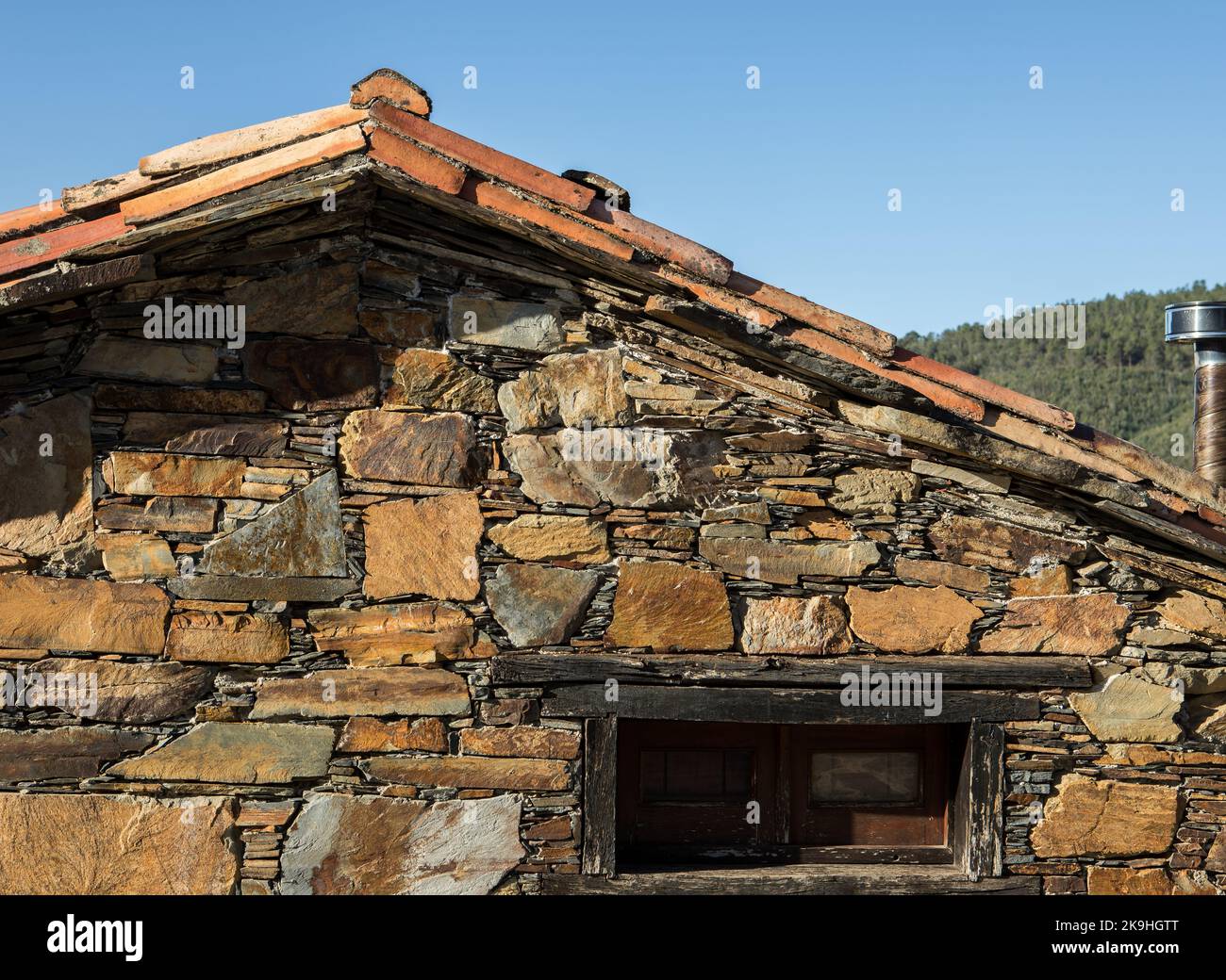 Side facade of a typical portuguese shale house "casa de xisto Stock