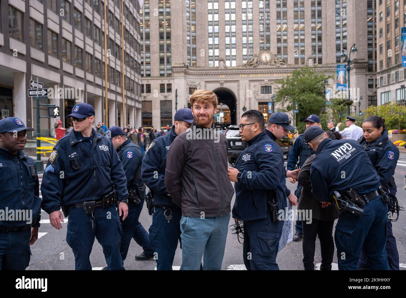 New York, USA. 28th Oct, 2022. Environmental activists block Park Avenue outside JP Morgan headquarters to protest the bank's investment in fossil fuels and call on Governor Hochul to tax the wealthy and fund climate iniatives on October 28, 2022 in New York, NY. Sixteen protesters were arrested by police. (Photo by Matthew Rodier/Sipa USA) Credit: Sipa USA/Alamy Live News Stock Photo