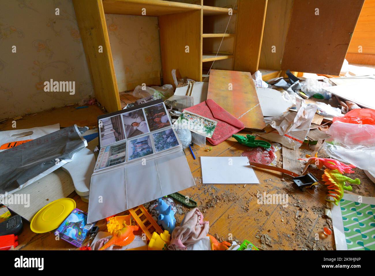 Chinese home abandoned due to relocation but then pilfered and ransacked by thieves looking for valuables. Stock Photo