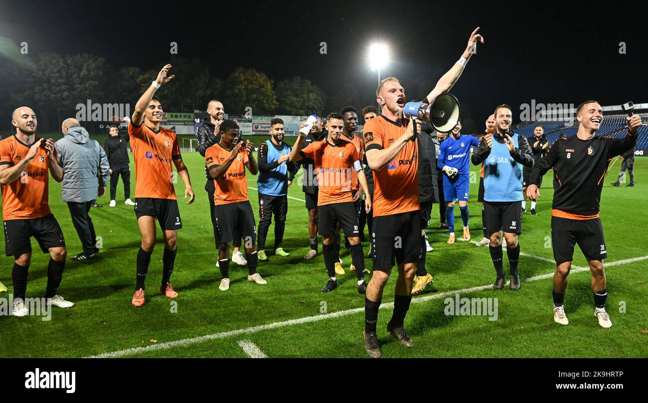 Players of Deinze pictured celebrating after winning a soccer game