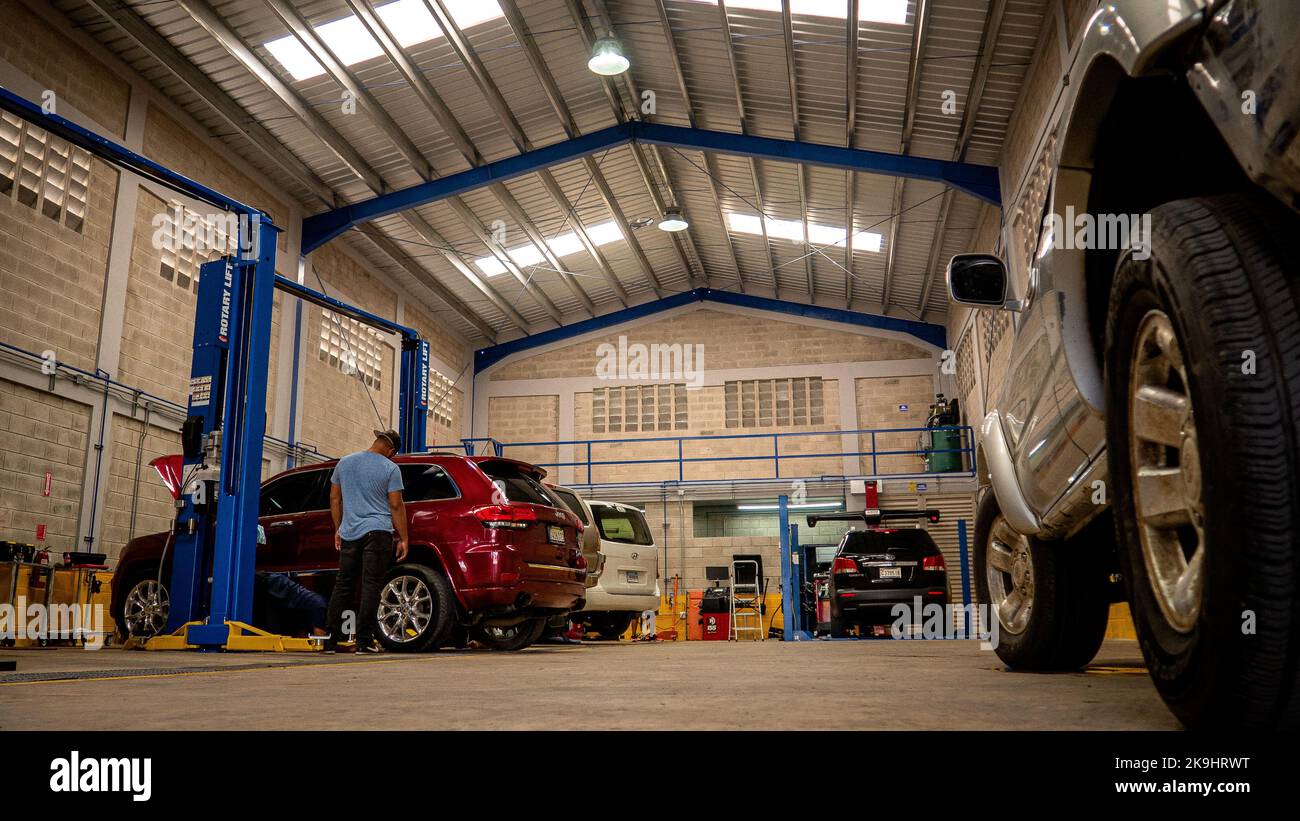 Professional mechanics workshop where automotive mechanics engineers work Stock Photo