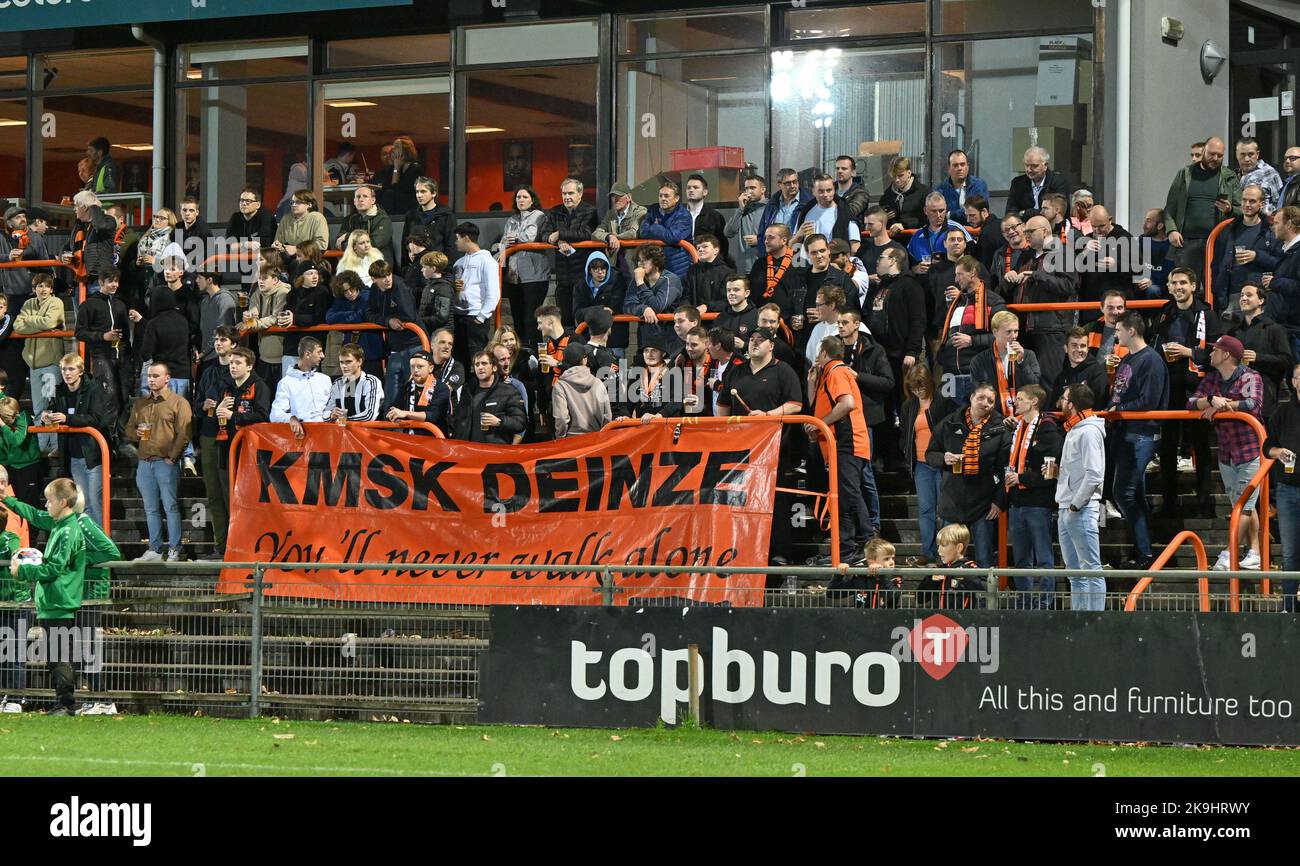 Fans and supporters of Deinze pictured during a soccer game between