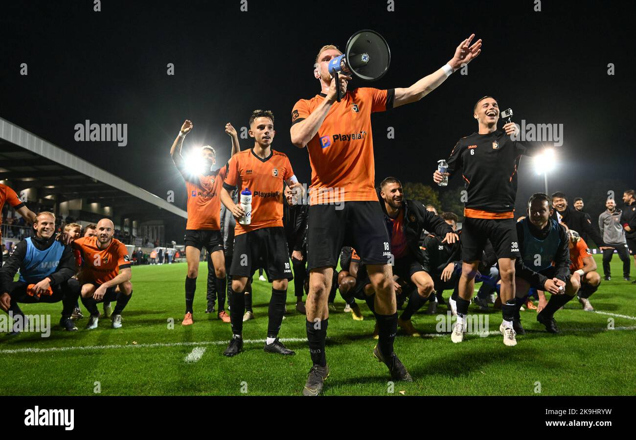 Players of Deinze pictured celebrating after winning a soccer game