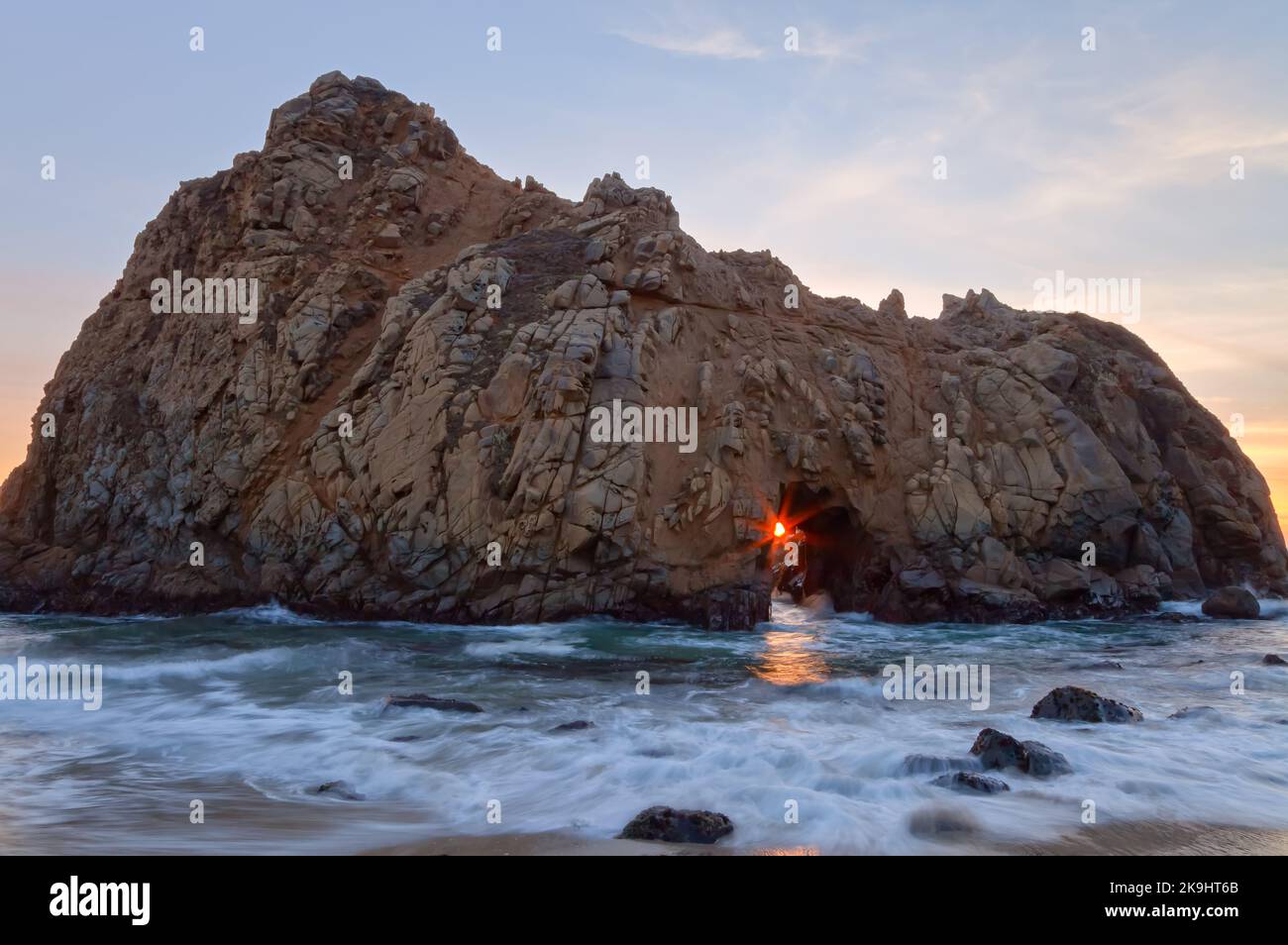 Keyhole Rock, a large, rugged rock formation with a natural archway ...