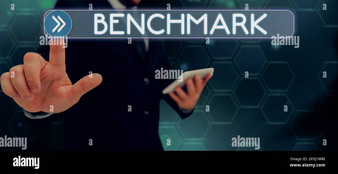 Conceptual display Benchmark. Business showcase using or able to use two languages especially with equal fluency Businessman in suit holding open palm Stock Photo