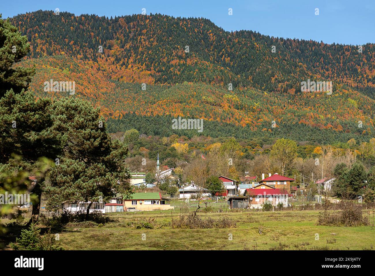 a village built on the slopes of the mountains, creating a beautiful ...