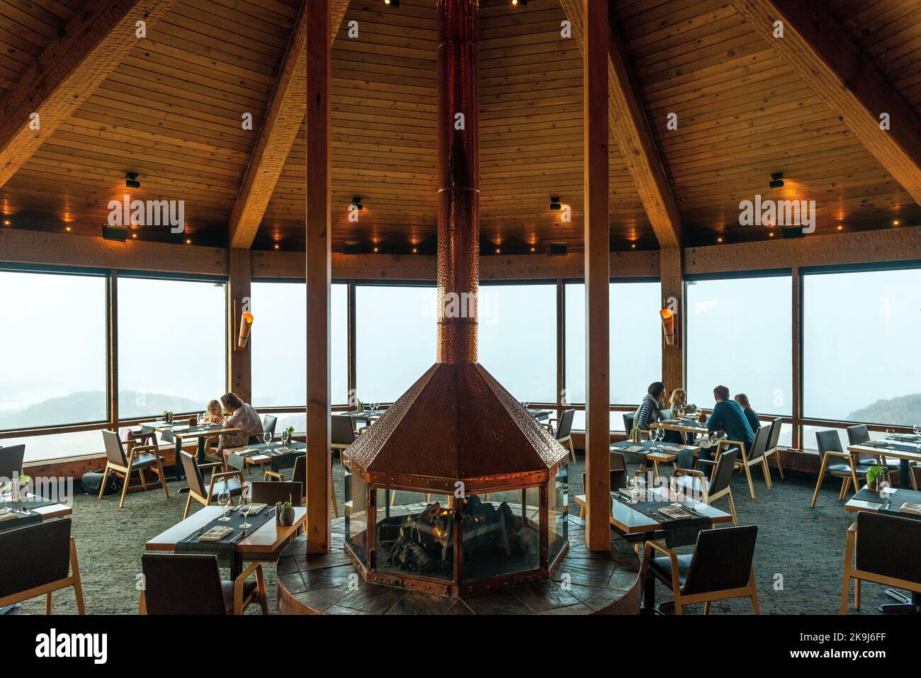 Interior of The Pointe restaurant with people, Wickaninnish Inn, Tofino, Vancouver Island, Canada. Stock Photo