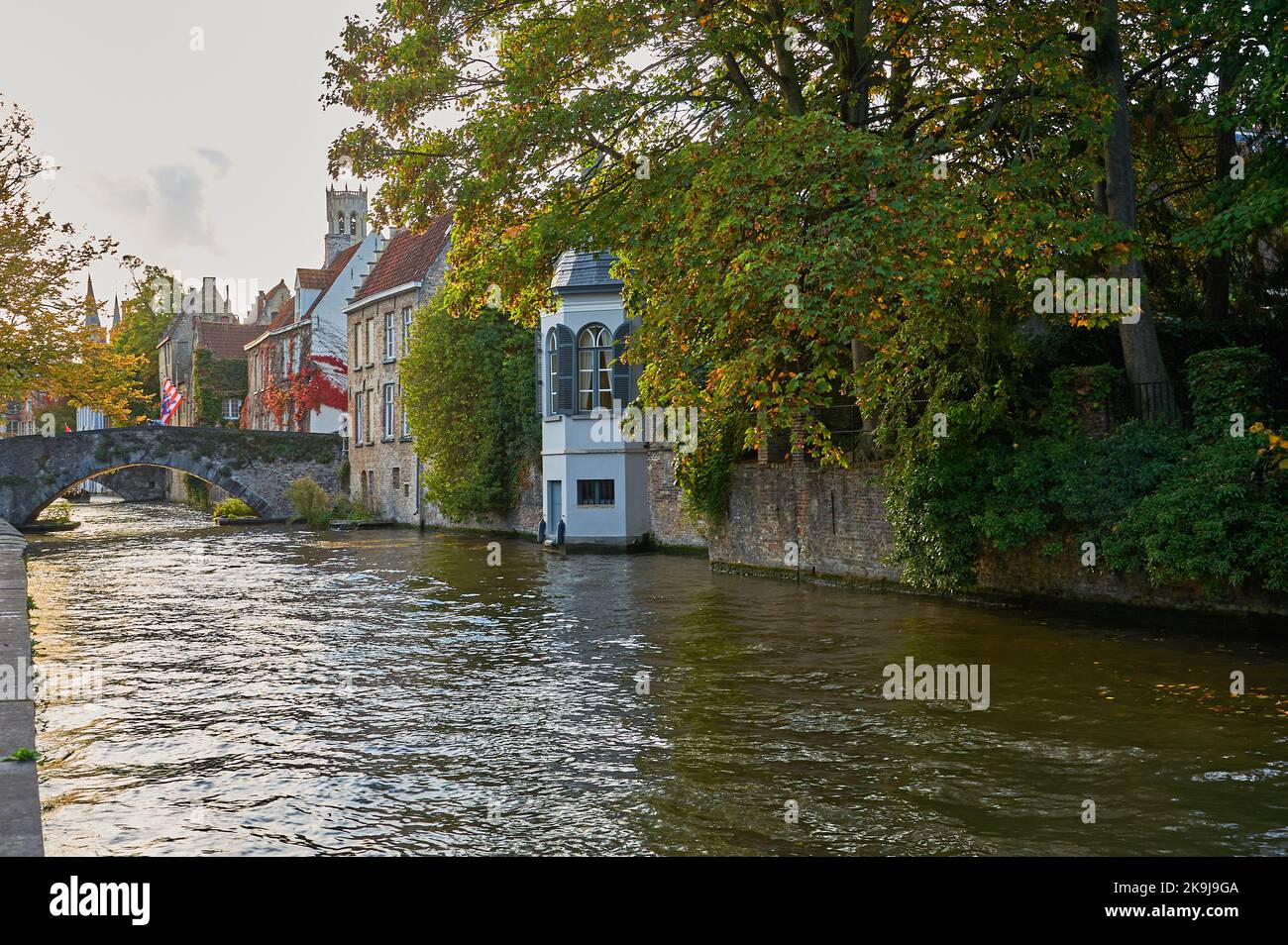 Autumn canal scene on the Groenerei in Bruges, Belgium Stock Photo