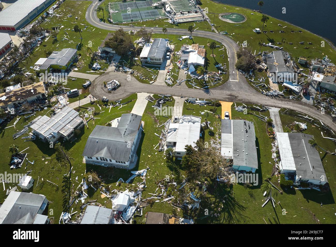 Badly damaged mobile homes after hurricane Ian in Florida residential