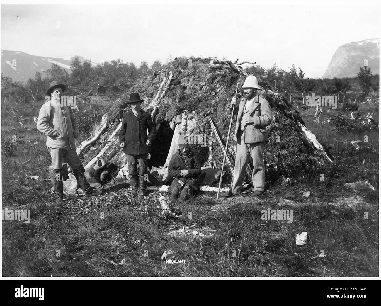 Station Inspector Karl Tirén at a joint camp near Nikkaluokta. Tirén is the man at the far right of the picture. Stock Photo