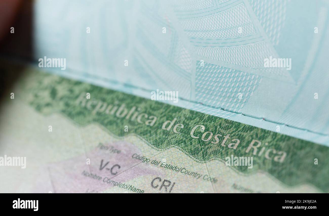 Issued costa rica visa in passport macro close up view. Visa stamp to cross boarder Stock Photo