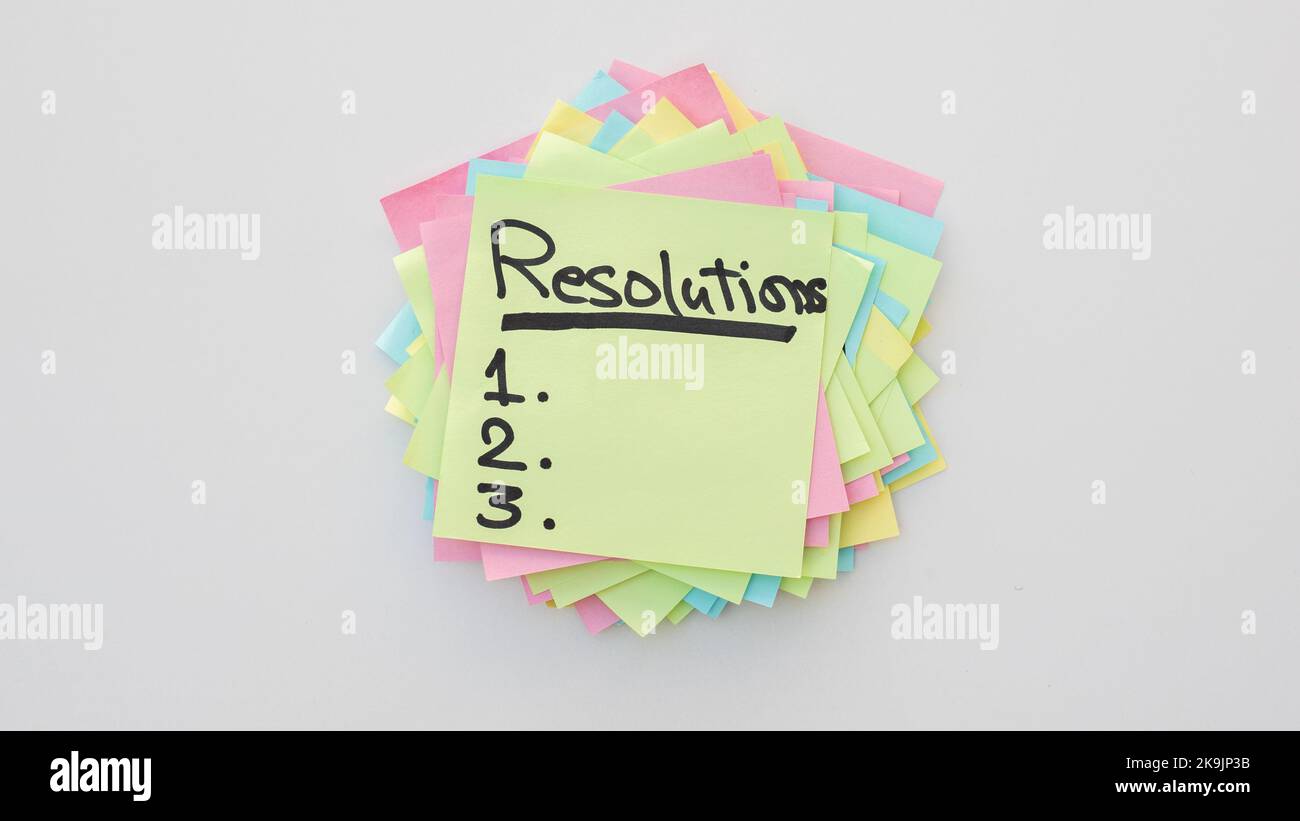 Handwritten resolutions list 1 2 3 on a sticky notes Stock Photo