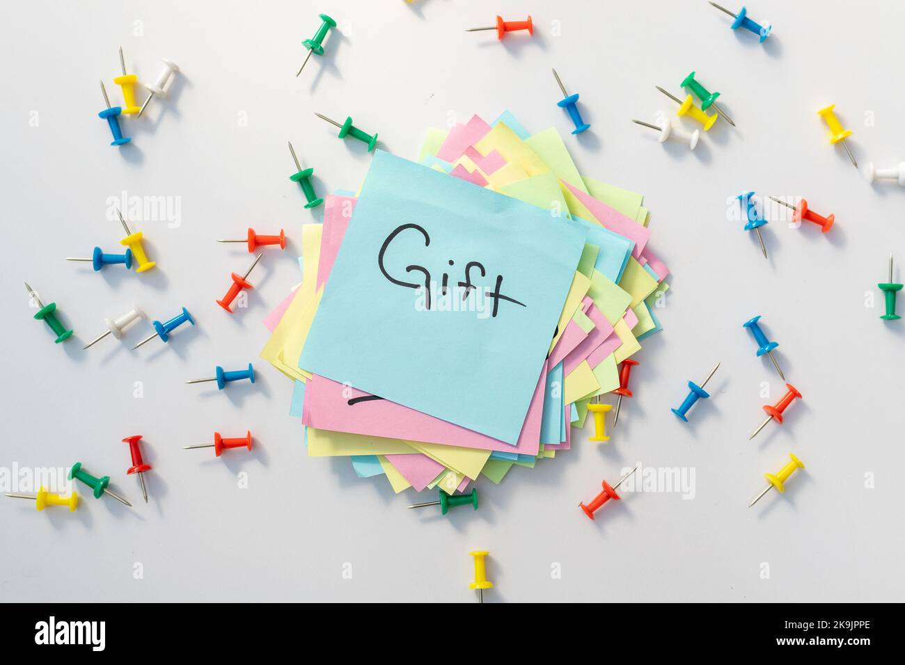 Gift handwritten word on a sticky note Stock Photo