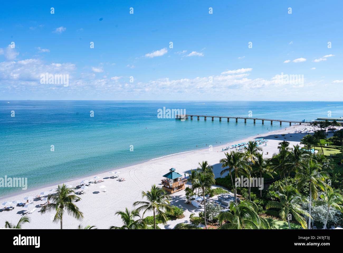 Aerial view of Ocean in Florida waith Fishing Pier and Beach in foreground. Stock Photo