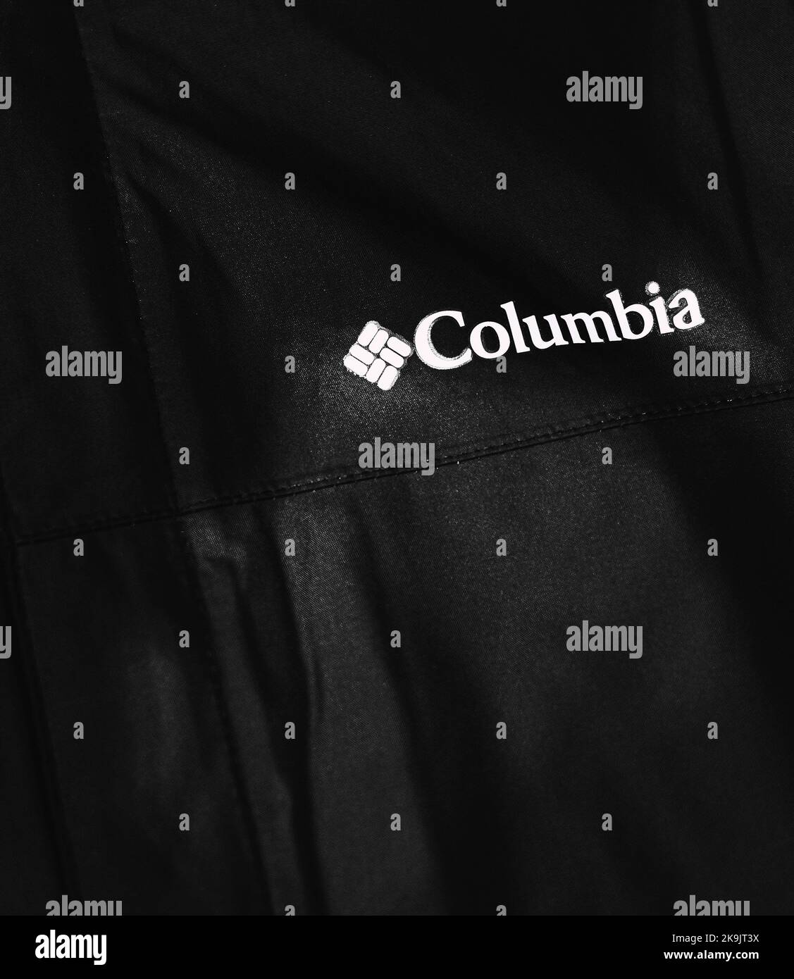 logo of Columbia on the special fully weather proof and membrane material jacket, the worldwide sportswear manufacturer Stock Photo