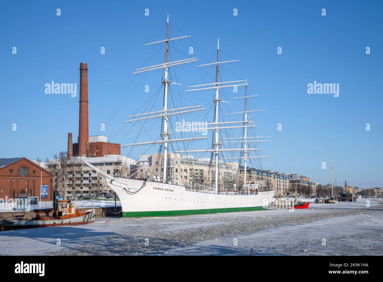 TURKU, FINLAND - FEBRUARY 23, 2018: Vintage sailboat of Suomen Joutsen (Finnish Swan) in cityscape on a sunny February day Stock Photo