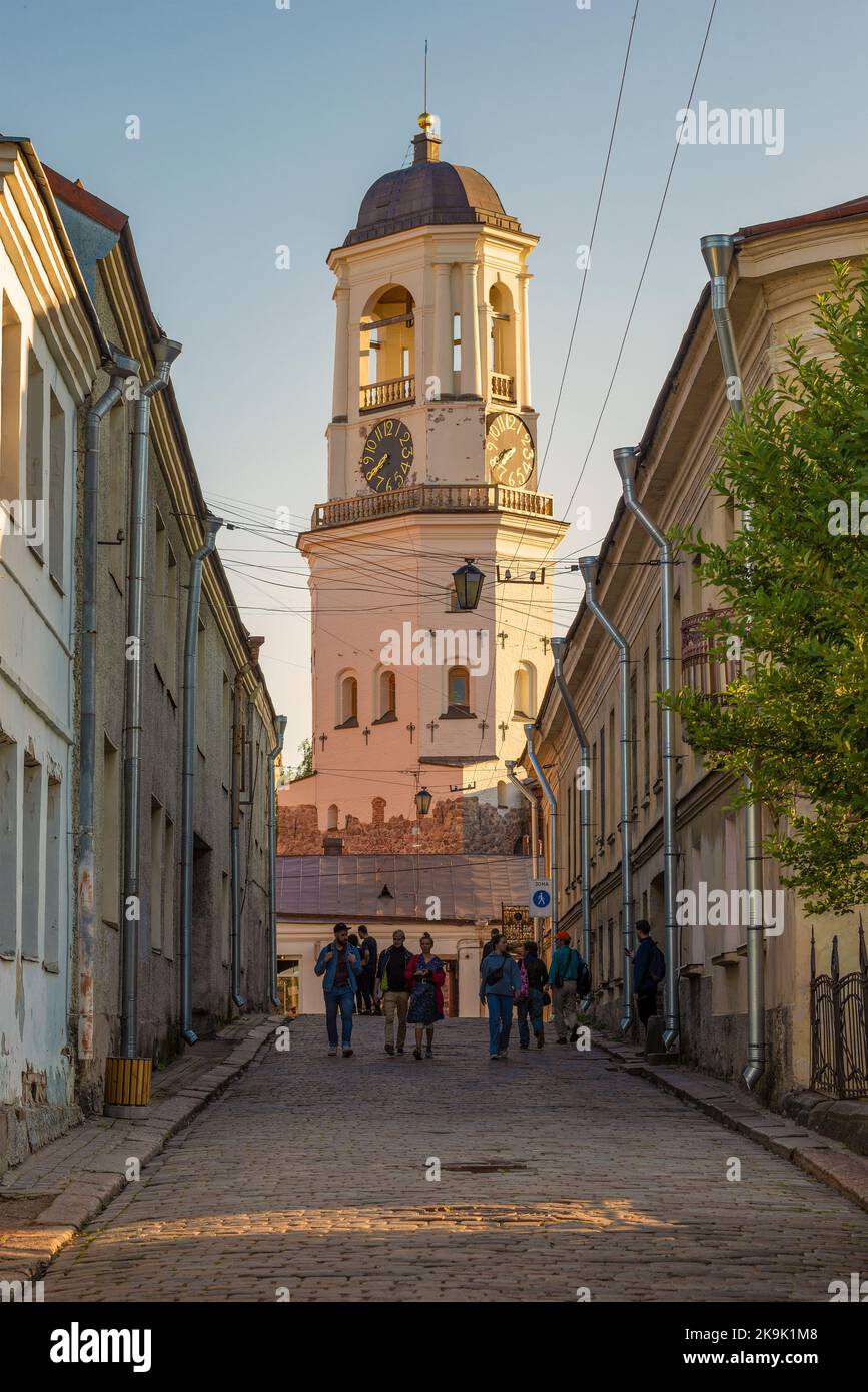VYBORG, RUSSIA - AUGUST 04, 2021: View of the ancient Clock Tower from Vodnaya Zastava street on a warm August evening Stock Photo