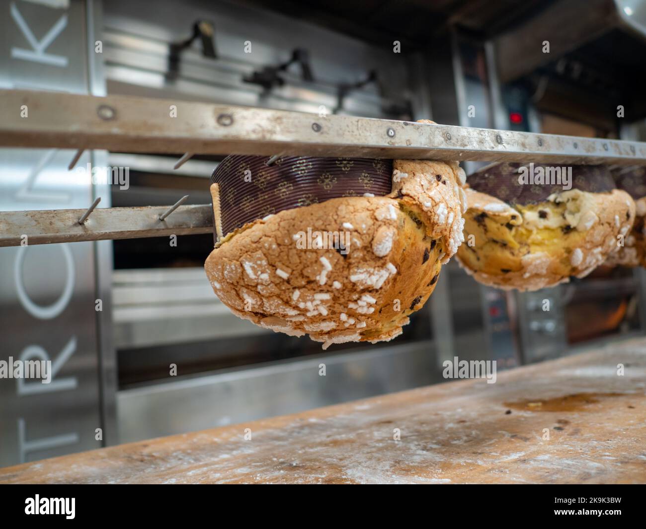 panettone cooking secrets concept hanging up down in the kitchen Stock Photo